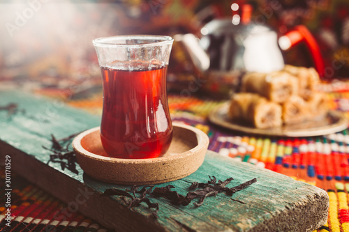 delicious turkish tea and baklava on colorful rug