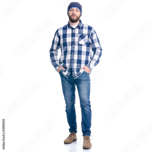 Man in shirt, warm hat standing smiling looking