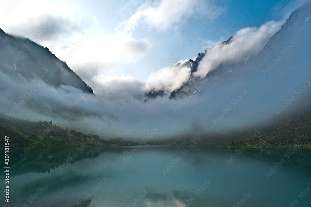 lake in mountains fog