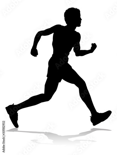 Silhouette runner in a race track and field event