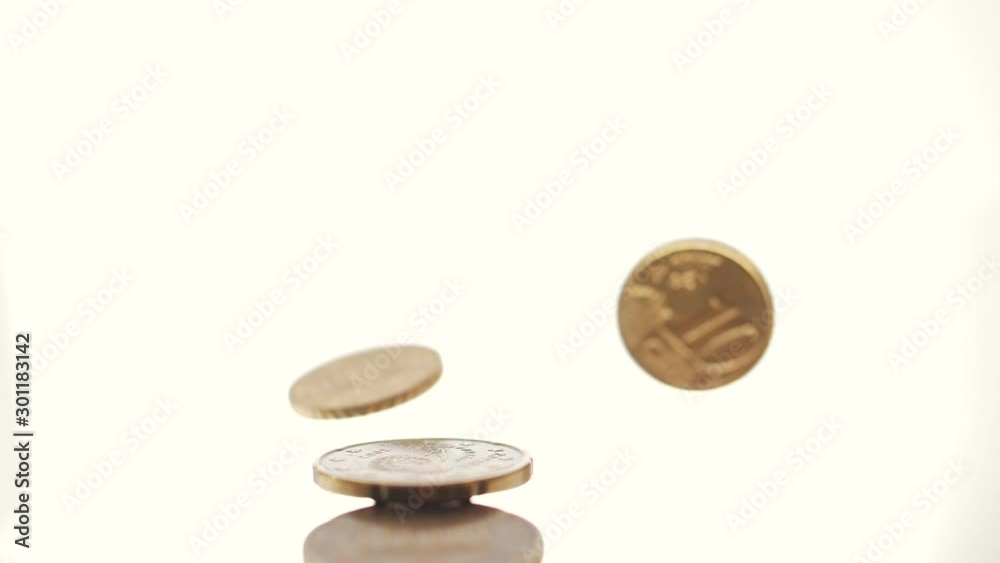 Euro coins falling on a white background. Slow-motion 120fps Euro coins falling on a white background. Slow-motion 120fps