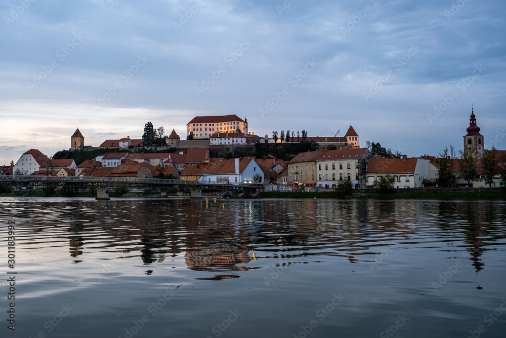 Ptuj refelction a city in the eastern part of slovenia during sunset