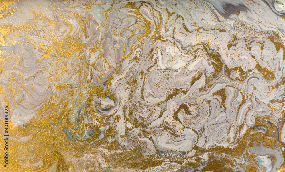 Pale marble pattern with golden glitter. Abstract liquid background. Pale marble pattern with golden glitter. Abstract liquid background.