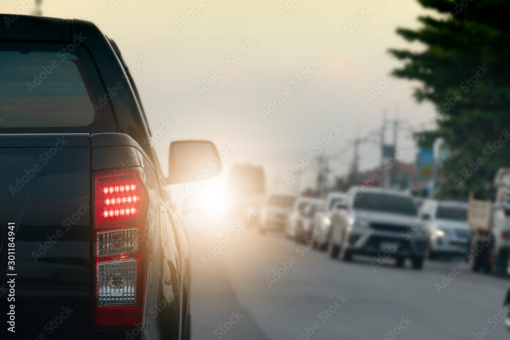 ฺBrake of pick up car on asphalt roads during rush hours for travel or business work.