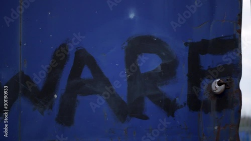 Beware of Dog warning, sign outside a scrap yard, home made signpost, stay out