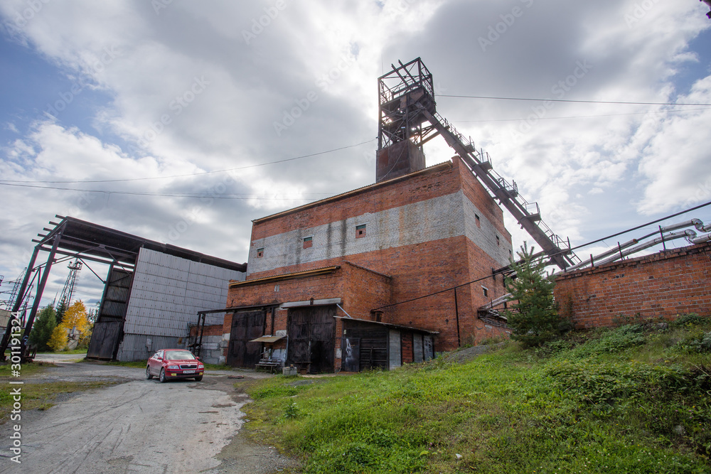 Old mine shaft headframe blue sky Old mine shaft headframe blue sky