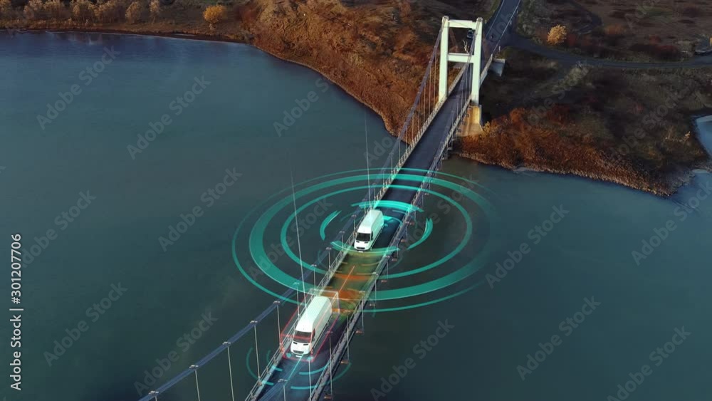 Autonomous Electric Van semi truck car driving on a highway with technology assistant tracking information, showing details. Visual effects clip