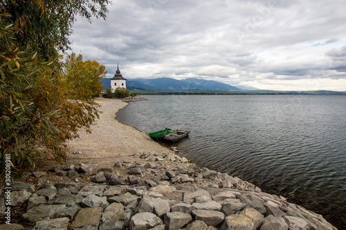 Obraz na płótnie Water reservoir Liptovska Mara in backgroud with High Tatra Mountains w salonie