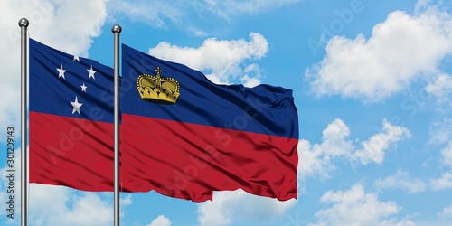 Samoa and Liechtenstein flag waving in the wind against white cloudy blue sky together. Diplomacy concept, international relations.