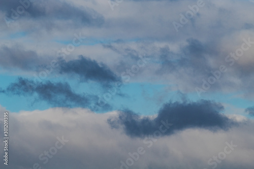 clouds of different colors in the sky photo