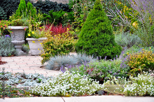 A path in the garden made from tumbled pavers.