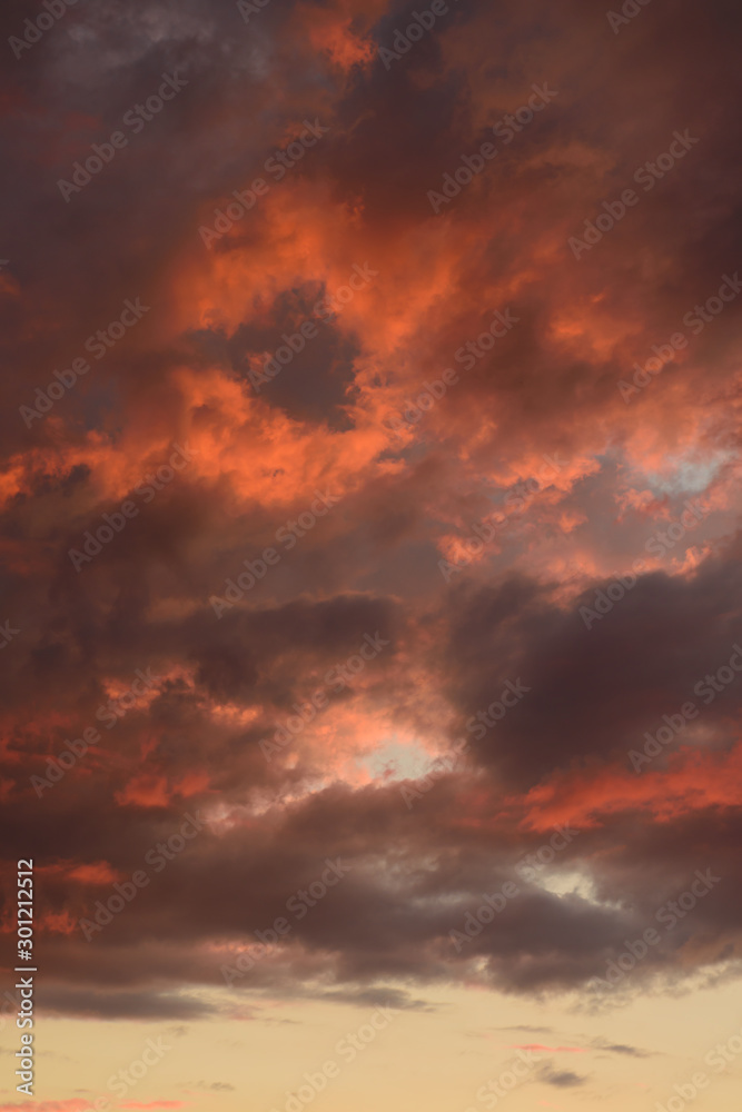 Dark sky with red clouds. Horizontal shot.