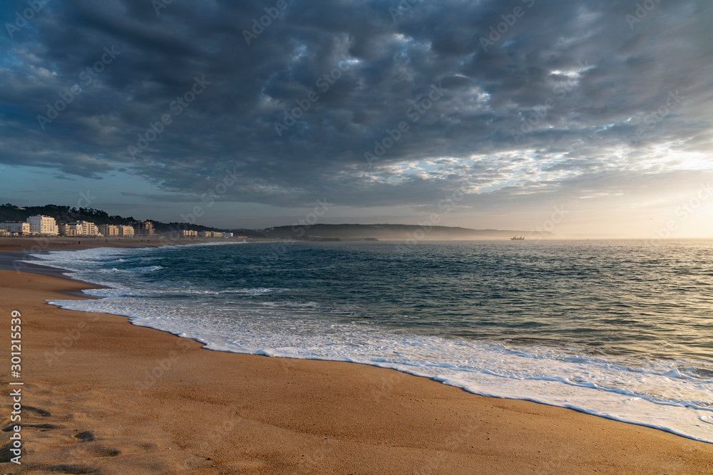 Evening time at Atlantic ocean in Nazare, Portugal.