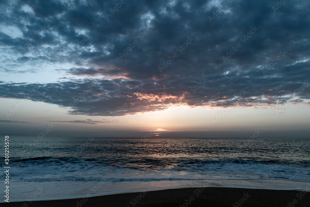 Fototapeta premium Evening time at Atlantic ocean in Nazare, Portugal.