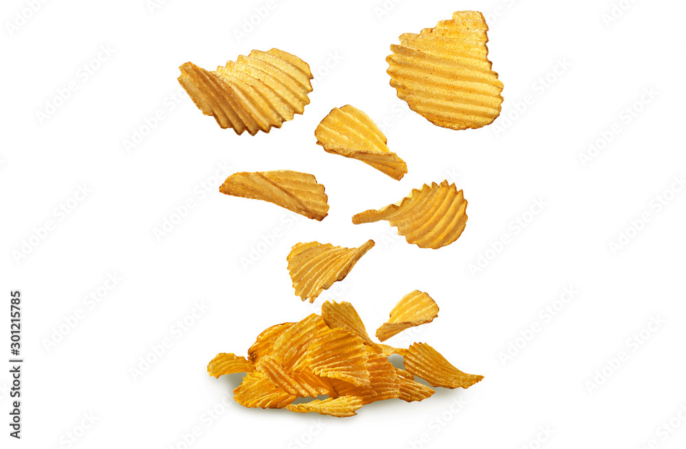 Potato crisps falling down, isolated on white background with copy space for text or images. Crispy, palatable chips. Advertising. Close-up. Potato crisps falling down, isolated on white background with copy space for text or images. Crispy, palatable chips. Advertising. Close-up.