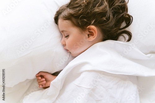 Sleeping little girl photo