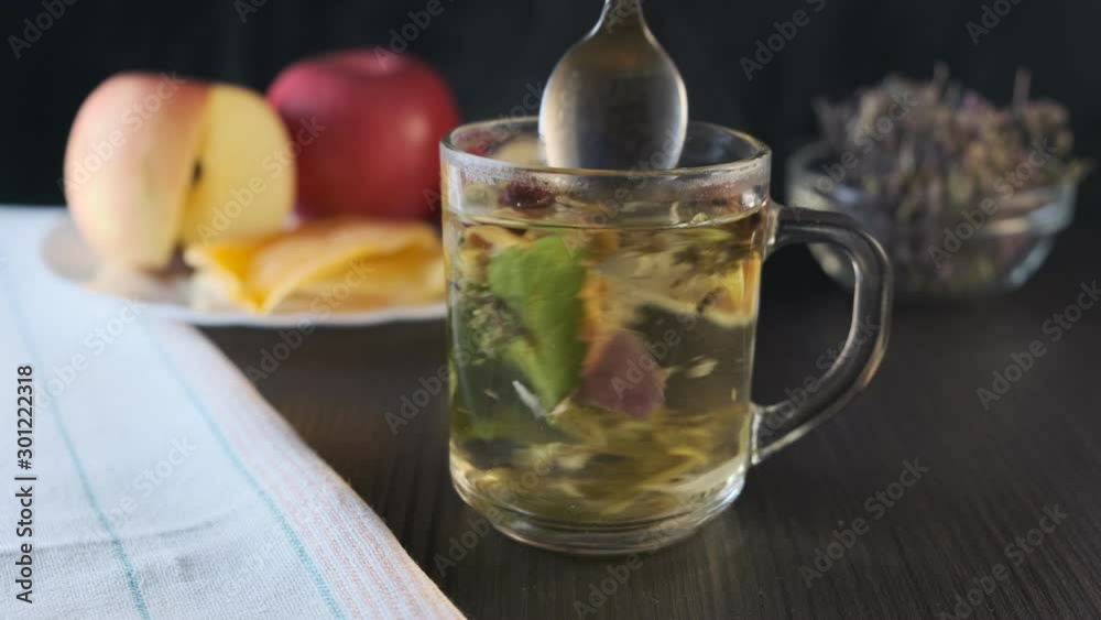 making herbal tea from berries, flowers and herbs