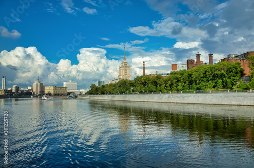 Obraz na płótnie Moscow, Russia - July 11, 2018: River walk along the Moscow river. View of the embankments of Taras Shevchenko and Krasnopresnenskaya. White House Buildings and Radisson Royal Hotel w salonie
