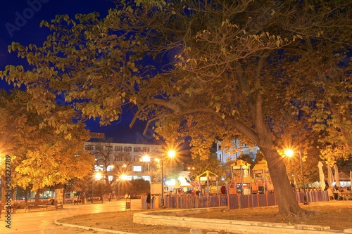 Evening Park near the Opera house (Varna, Bulgaria) in autumn. The walk is 6 November 2019.