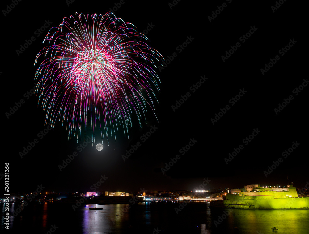 Violet fireworks isolated in dark background close up with the place for text Violet fireworks isolated in dark background close up with the place for text