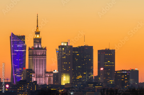 Nowoczesne wieżowce w Warszawie podczas zachodu słońca, Polska photo