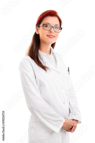 Smiling young female scientist in white uniform