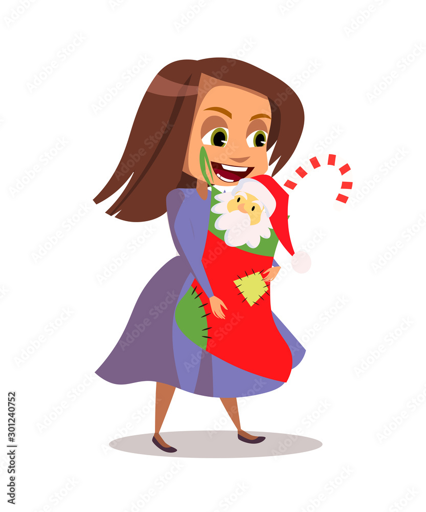 Happy girl holding gift stocking isolated on white Happy girl holding gift stocking isolated on white