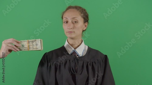 Corrupt Woman Judge Receives Money photo