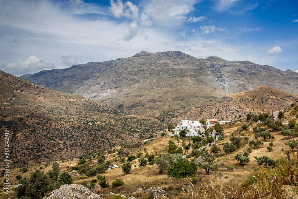 Beautiful Crete mountainous landscape with white walled village in valley
