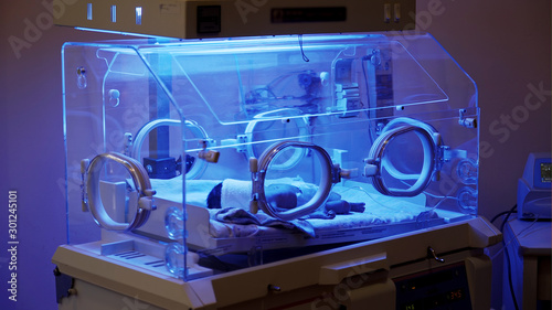 A premature baby in a incubator machine