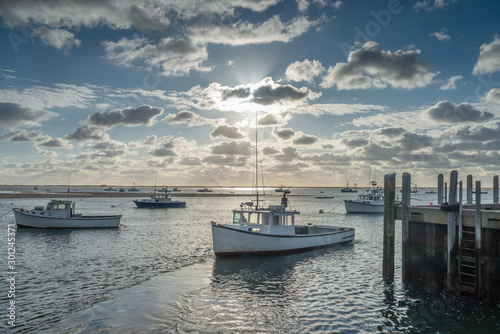 Boats at rest in harbor near Chatham MA