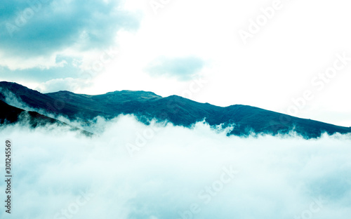 mountain  in high altitude mountains in clouds and fog