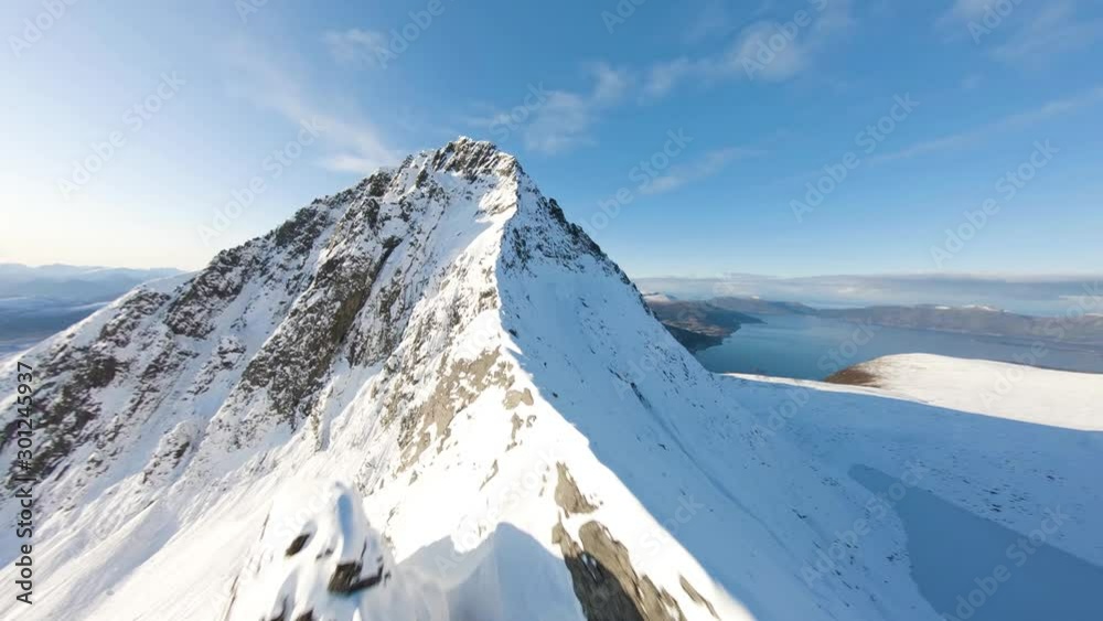 Aerial View of Mountain Covered in Snow