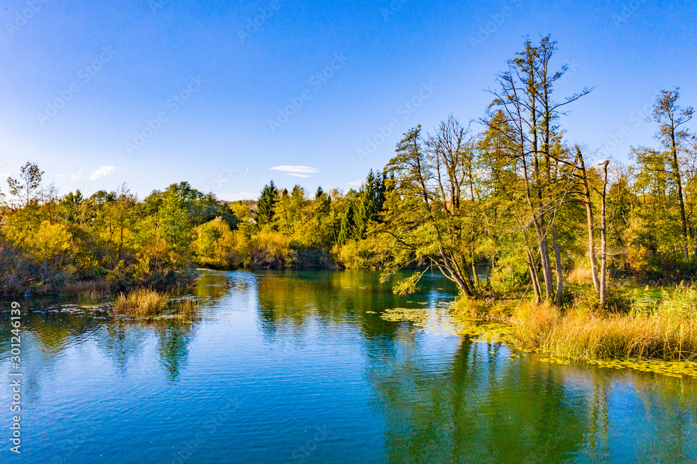 Fototapeta premium Panoramic view of Mreznica river in autumn from drone, Croatia, popular touristic destination