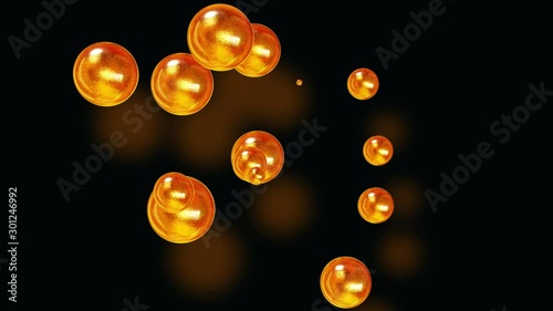 amasing abstract background of metaballs as if glass drops or spheres filled with gold sparkles merge together and scatter move around cyclically in 4k. Looped seamless animation with glisten bubbles photo