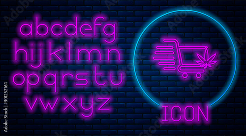 Glowing neon Shopping cart with marijuana or cannabis leaf icon isolated on brick wall background. Online buying. Delivery service. Supermarket basket. Neon light alphabet. Vector Illustration