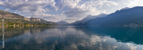 panorama of lake annecy in the morning with cloudy sky