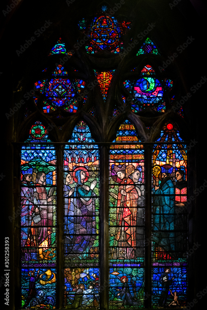 DUBLIN, IRELAND, DECEMBER 21, 2018: Magnificent stained glass from Church of St. Augustine and St. John, commonly known as John's Lane Church, a large Roman Catholic Church located on Thomas Street.