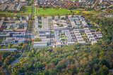 Potsdam, Germany, district Bornstedt, new construction area for a new residential area, during early autumn - aerial view