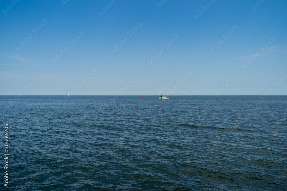 Fototapeta premium Beautiful seascape. Different colors of sea and sky. Nautical background.