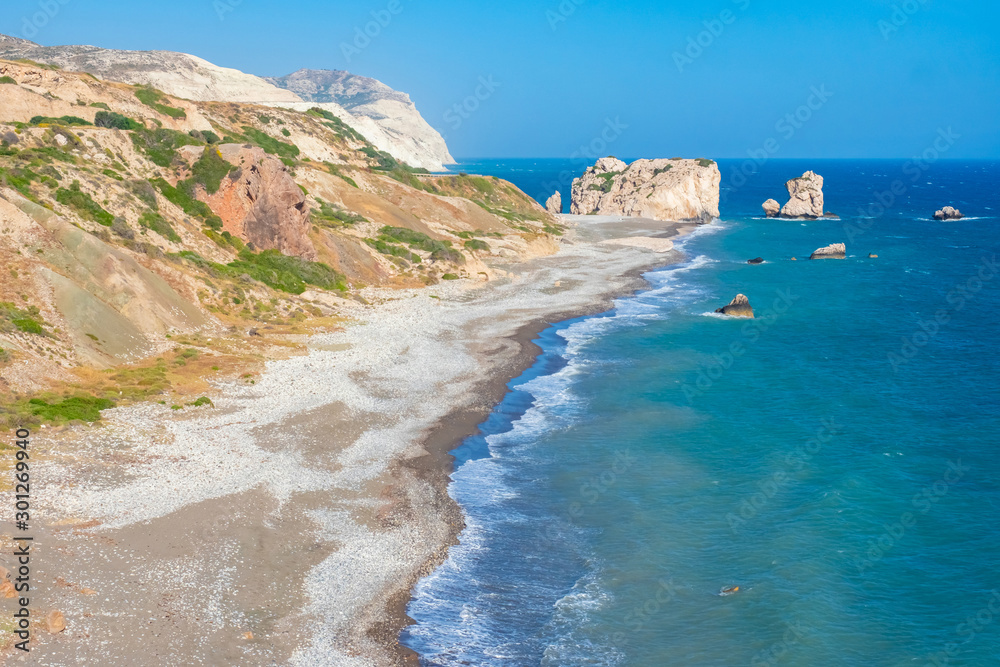 Cyprus. Aphrodite Bay. Aphrodite's rock, the view of the beach of Aphrodite. Petra Tou Romiou. Mediterranean sea. Sea cliff. Pathos. Kuklia. The beaches in Cyprus. Coast Of The Republic Of Cyprus.