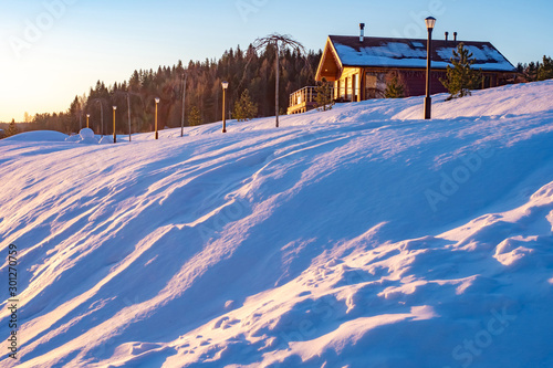 House on top of a snow-cove...