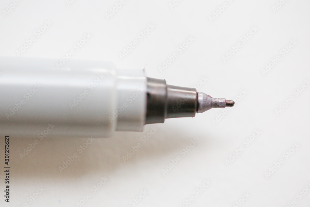 Pen point close-up on white background - Image