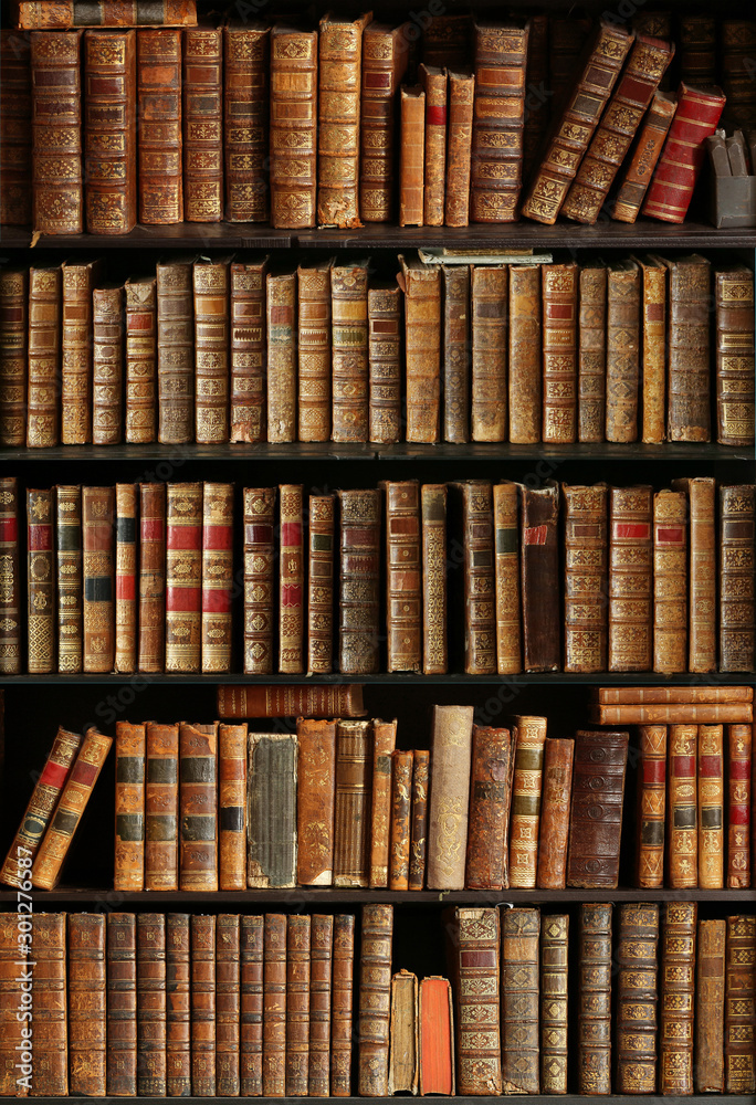 old books on wooden shelf