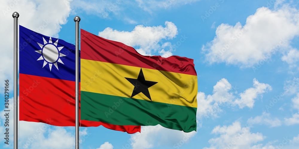 Taiwan and Ghana flag waving in the wind against white cloudy blue sky together. Diplomacy concept, international relations. Taiwan and Ghana flag waving in the wind against white cloudy blue sky together. Diplomacy concept, international relations.