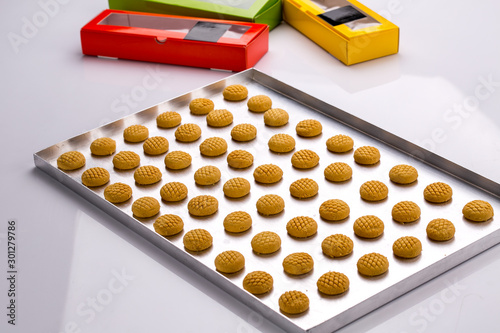 Christmas oriental shortbread cookies on an oven tray 