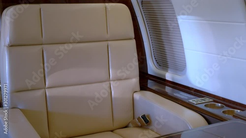 Modern private business jet leather seats and interior