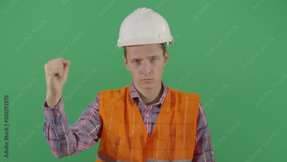 Rebellious Adult Man Engineer Doing A Sign Rebellious Adult Man Engineer Doing A Sign