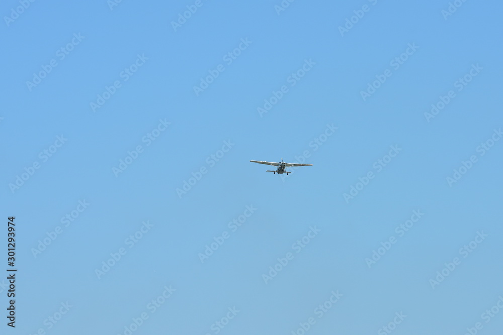The plane is flying into the airport to land at Suvarnabhumi Airport. Thailand. The plane is tilting to turn into the airport. The plane is flying into the airport to land at Suvarnabhumi Airport. Thailand. The plane is tilting to turn into the airport.
