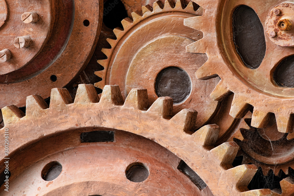 Close up pattern of sculpture using old rusted gears Close up pattern of sculpture using old rusted gears